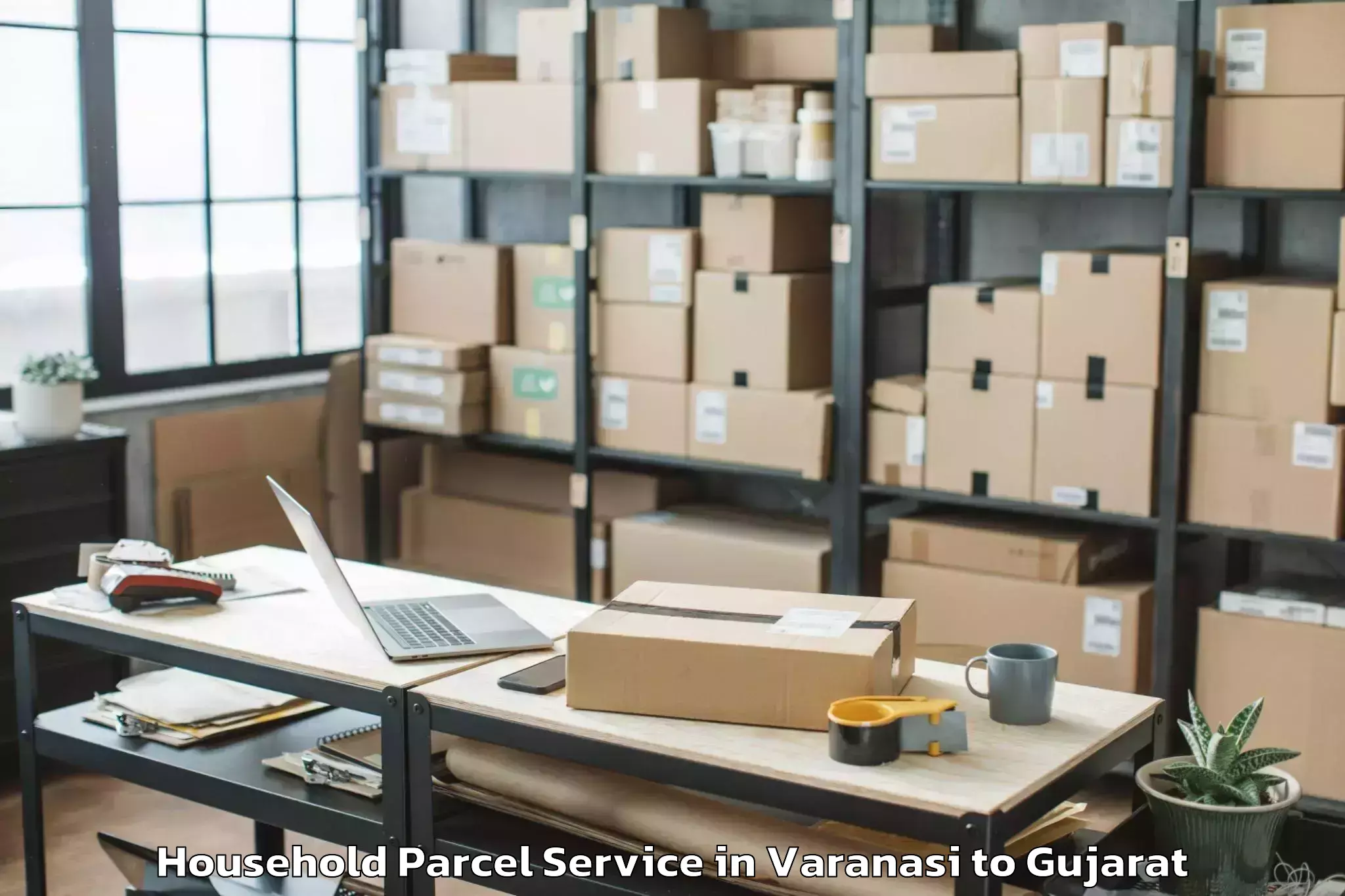 Book Varanasi to Vaghodia Ina Household Parcel Online